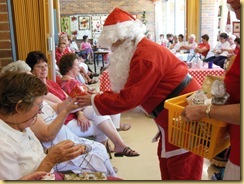 Santa giving gifts