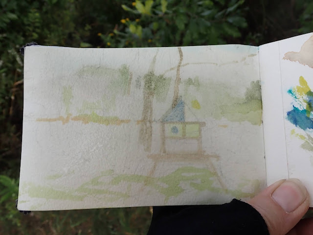 Sketchbook page with partially scrubbed out image of climbing structure.