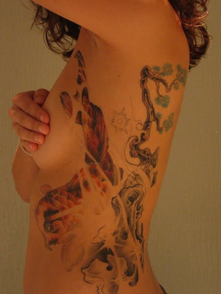 The main koi fish tattoo designs are hearts and anchors with the addition 