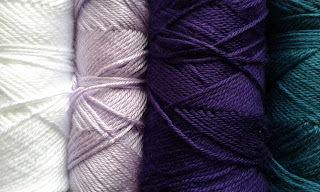 purple, lavender, white and teal yarn