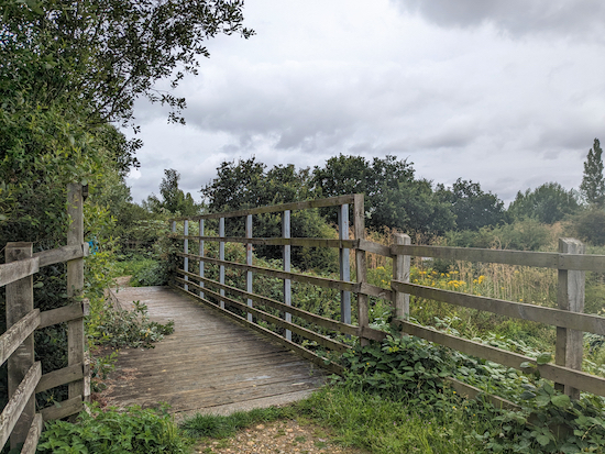 Cross the bridge then head SE for 20m to reach a junction