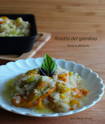 Risotto con fiori di zucchini, datterini gialli e zucchini