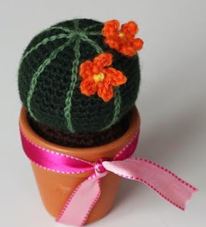 http://www.craftsy.com/pattern/crocheting/home-decor/round-cactus-english/52052