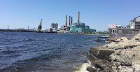 Coal shipments arrived by barge at Brayton Point Power Station on the shores of Mount Hope Bay in Somerset, Mass. The plant has long been a linchpin of the South Coast economy. At its height, it employed more than 250 people and accounted for a third of the local tax base. It is scheduled to close Wednesday. (Credit: Benjamin Storrow/E&E News) Click to Enlarge.