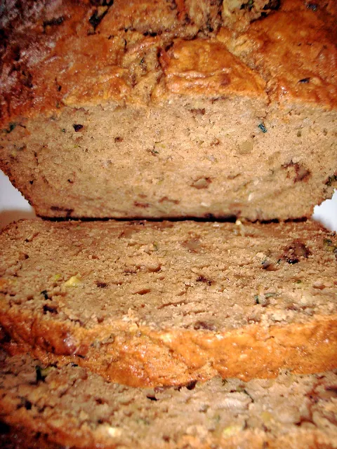 Slices of a finished loaf of zucchini bread.