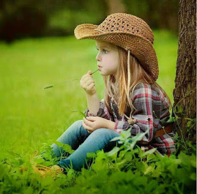 a-stylist-babygirl-sitting-on-the-grass