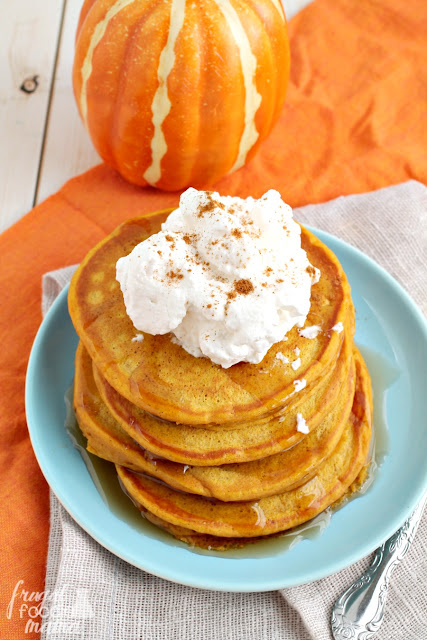 Enjoy all the deliciousness of a slice pumpkin pie for breakfast minus the guilt with these healthier Pumpkin Pie Greek Yogurt Pancakes.