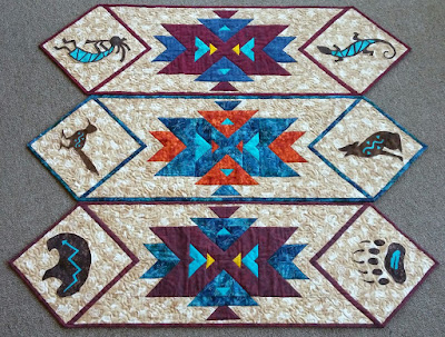 http://www.craftsy.com/pattern/quilting/home-decor/southwest-kokopelli-table-runner-pattern/174975