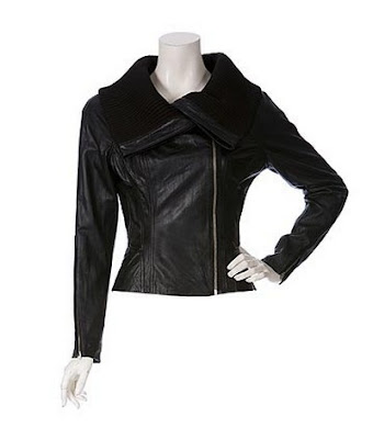 Kristen, wearing a black leather jacket. - Kristen Stewart 415x627