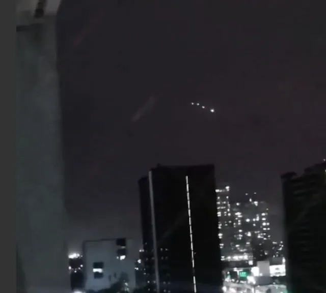 Awesome UFO sighting over Chile skyscraper recently.
