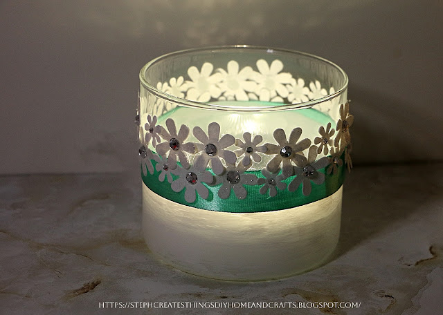 Shimmery flower glass jar light display