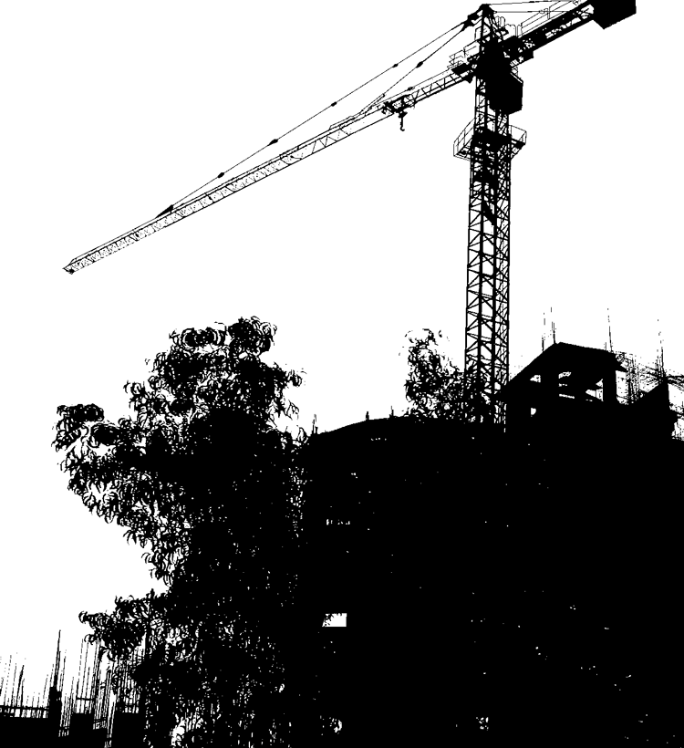 silhouette of crane at construction site