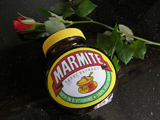 Marmite jar and a red rose