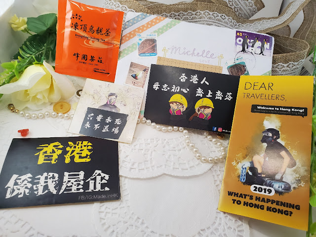 Parcel recieved from postcrosser in China. These items are of historical and political significance.