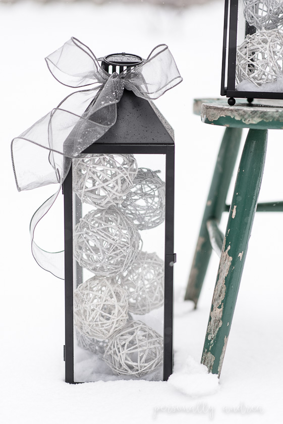 Hurricane Lanterns Decorated for Winter with leftover Christmas decor and found items from around the house  | personallyandrea.com