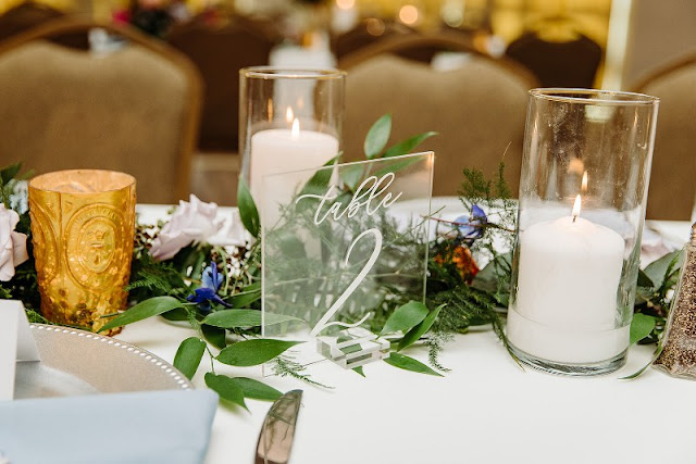 acrylic table number with greenery runner centerpiece and candles