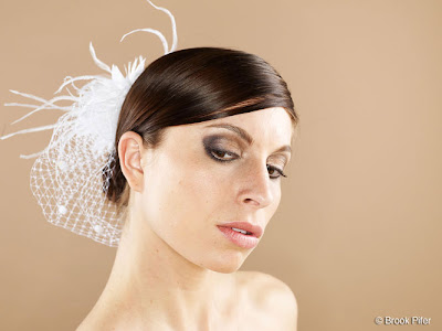 There is a growing trend for bridal headpieces Feathers are such a bold 