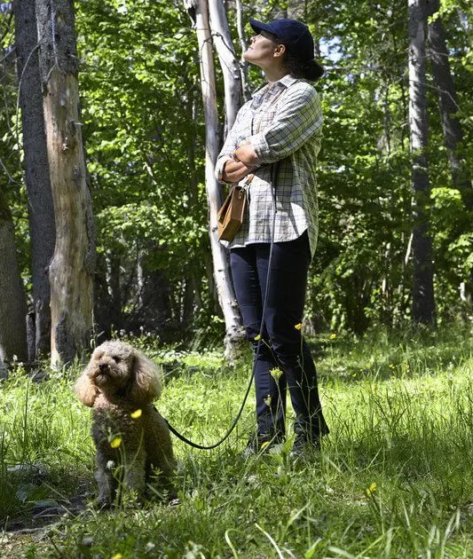 Crown Princess Victoria, with her dog Rio, visited Angso National Park. Victoria wore a checked shirt by Andiata