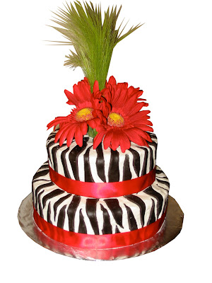 Zebra Print cake with Gerber Daisies on top. customize your color.