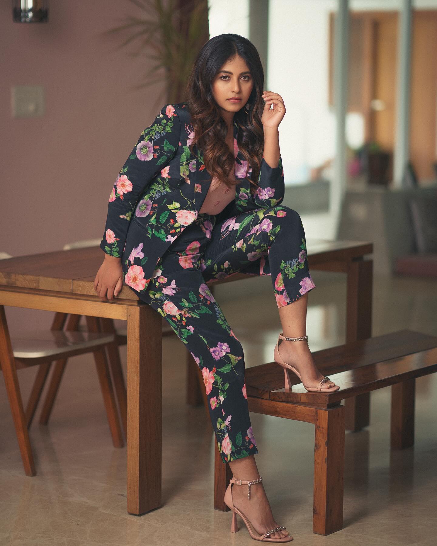 Actress Anjali Sitting pose on Table