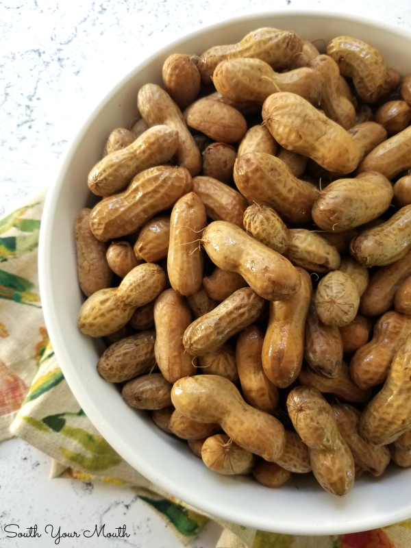 Classic Boiled Peanuts! An easy to follow recipe for this favorite Southern snack that will quickly walk you through seasoning variations and tips for cooking the perfect pot of boiled peanuts!