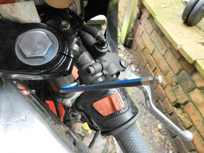 Aprilia RS 125 front brake system , cylinder brake hose and lever removal , front caliper removal , brake pad check