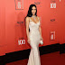 @kimkardashian wore a vintage white @johngallianoofficial dress and a @chanelofficial pearl runway bag to the #time100 gala , where #Skims was honored as one of the top companies of 2023. 