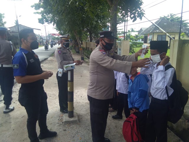 Cegah Penyebaran Covid-19, Polsek Labuhan Ruku Polres Batu Bara Terus Laksanakan Operasi Yustisi Secara Stasioner