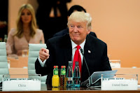 U.S. President Donald Trump attends a working session at the G-20 summit in Hamburg, northern Germany, Saturday, July 8, 2017. (Credit: Reuters/Markus Schreiber, Pool) Click to Enlarge.