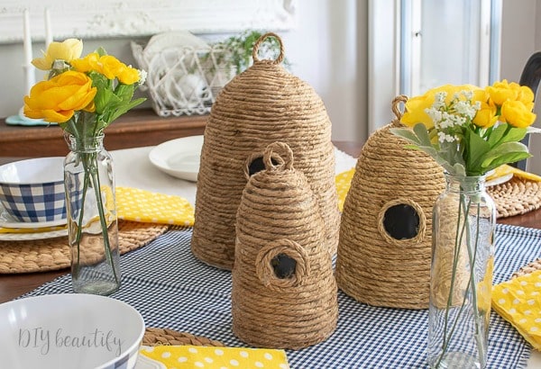 DIY bee skeps decorate summer dining room with yellow and blue