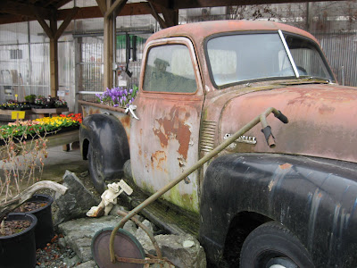 an old, rusty farm truck.