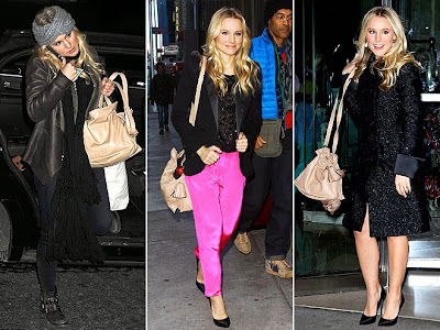 Kristen Bell loves to accent her feminine outfits with her cream Loewe “Flamenco” bag.