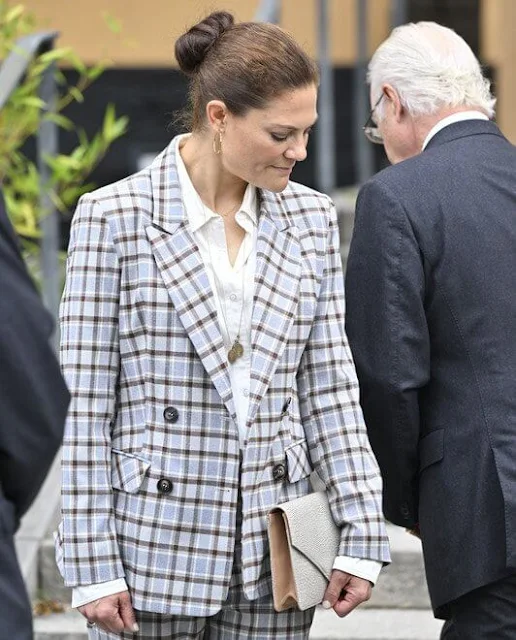King Carl XVI Gustaf and Princess Christina. Crown Princess Victoria wore a Karah grey checkered blazer from By Malina
