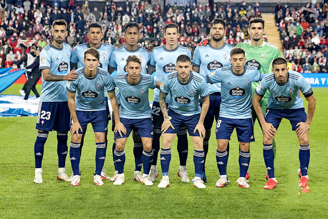 REAL CLUB CELTA DE VIGO. Temporada 2021-22. Brais Méndez, Jeison Murillo, Renato Tapia, Santi Mina, Néstor Araújo, Dituro. Denis Suárez, Kevin Vázquez, Javi Galán, Fran Beltrán, Thiago Galhardo. RAYO VALLECANO DE MADRID 0 REAL CLUB CELTA DE VIGO 0. Lunes, 01/11/2021, 18:30 horas. Campeonato de Liga de 1ª División, jornada 12. Madrid, estadio de Vallecas: 9.580 espectadores. Árbitro: Guillermo Cuadra Fernández, Baleares; VAR: David Medié Jiménez, Cataluña. Entrenadores: Rayo Vallecano: Andoni Iraola; Celta: Eduardo Coudet.