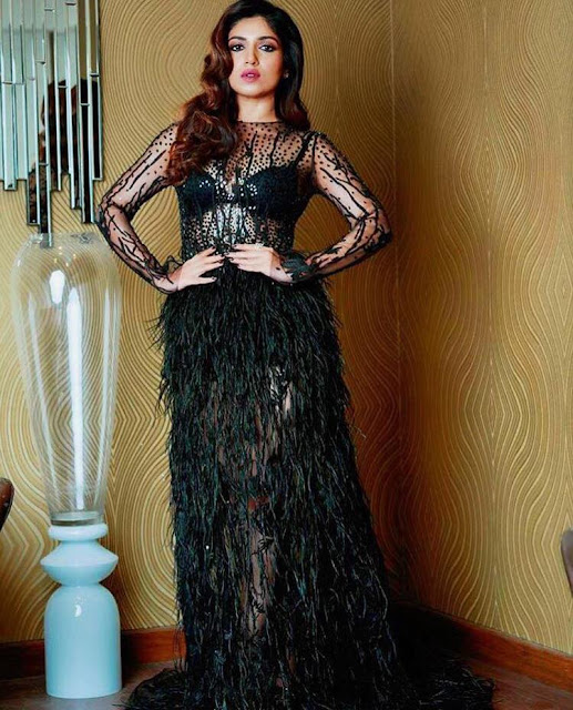 Bhumi Pednekar in a glamorous black outfit, radiating elegance and charm.