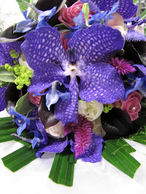 The Bridal Bouquet was in Deep Purple Black Vivid Blue Hot Pink