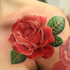 Best Rose Tattoo Artist : Tattoo Artists Of Color On Working With Dark Skin Allure : Rose tattoos do not only bring life and elegance, they are also an embodiment of beauty and a cool way to express femininity.
