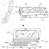 Mechanism for ergonomic integration of a digital camera into a mobile phone