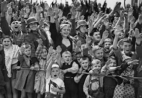 19 June 1940 worldwartwo.filminspector.com German women children German salute