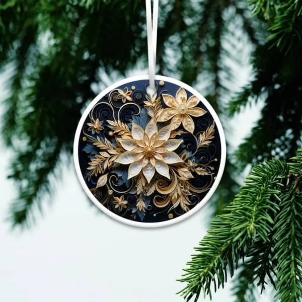 circular deep blue and cream colored tree ornament featuring floral papercut, paper sculpture, and quilled-style printed design