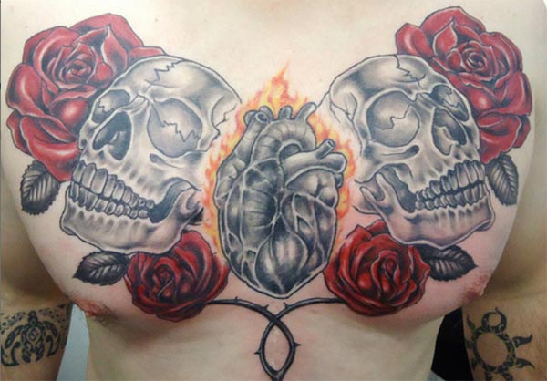 Amazing red roses and two skull heart tattoos design idea for the male's chest