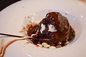 Chocolate sphere dessert melted