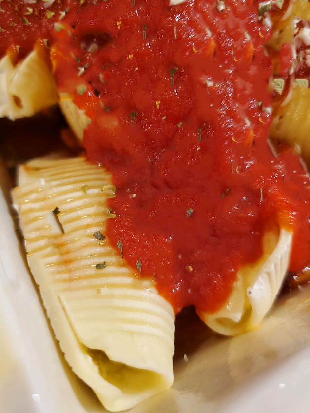 beef taco mix and cheese stuffed pasta shells