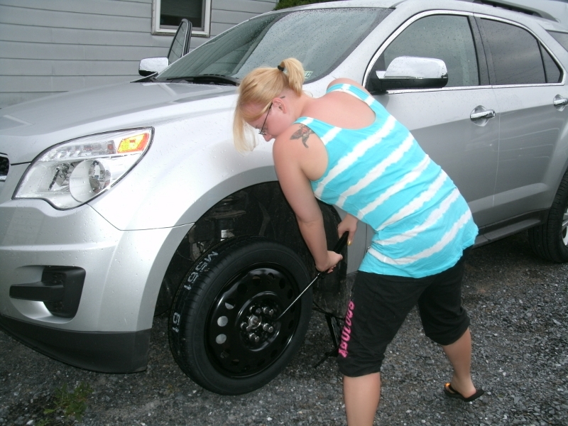 Yep, that's me, changing a tire. If you look close you can see China ...
