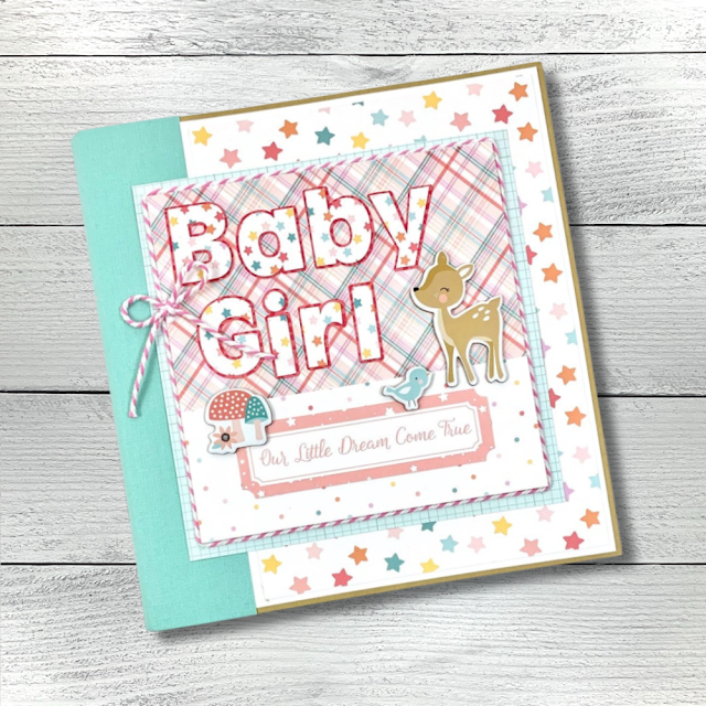 Baby Girl Scrapbook Mini Album with a deer, bow, a pretty plaid, and colorful stars