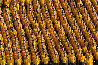 Group of people in yellow t-shirts