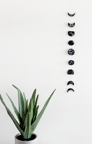 http://almostmakesperfect.com/2015/01/14/diy-marble-moon-phase-wall-hanging/