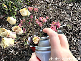 Preserve your wedding items with a beautiful DIY Wedding Flowers Shadowbox. Get the tutorial to make one on www.abrideonabudget.com.