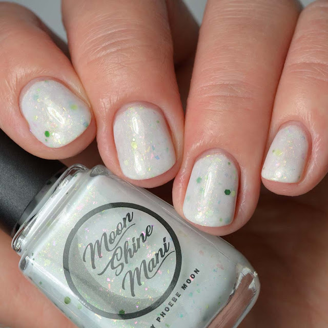 white glitter nail polish swatch