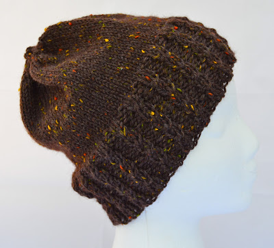 brown adult sized beanie, slightly slouchy hat with cables on the brim